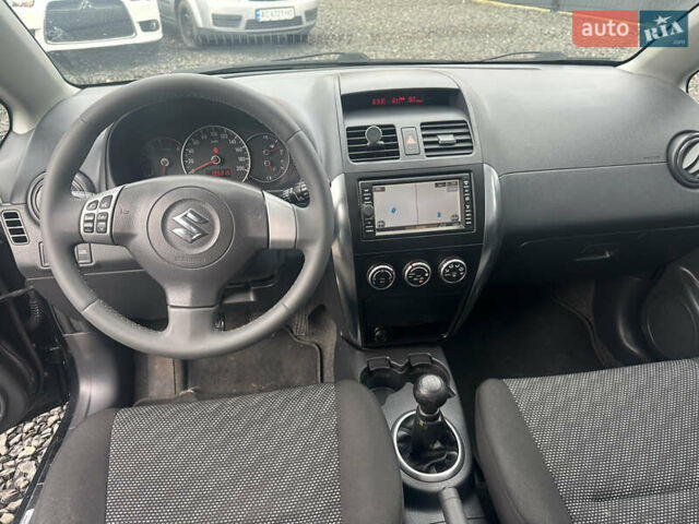 Черный Сузуки СХ4, объемом двигателя 1.6 л и пробегом 195 тыс. км за 7990 $, фото 15 на Automoto.ua