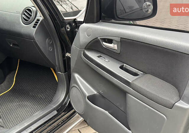 Чорний Сузукі СХ4, об'ємом двигуна 2 л та пробігом 240 тис. км за 6950 $, фото 19 на Automoto.ua