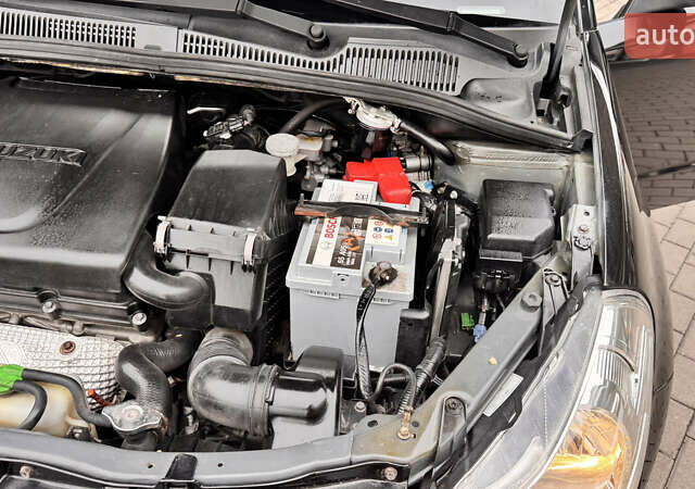 Чорний Сузукі СХ4, об'ємом двигуна 2 л та пробігом 240 тис. км за 6950 $, фото 32 на Automoto.ua