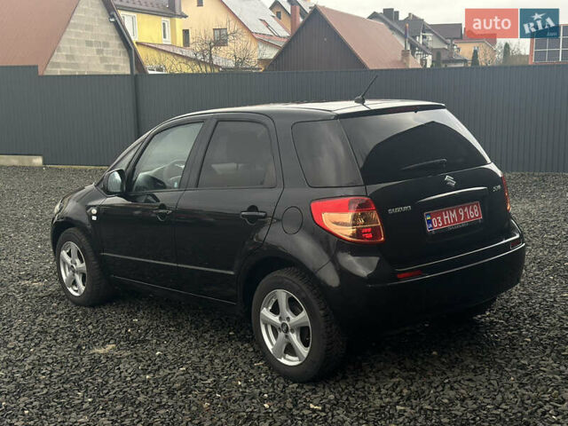 Черный Сузуки СХ4, объемом двигателя 1.6 л и пробегом 195 тыс. км за 7990 $, фото 3 на Automoto.ua