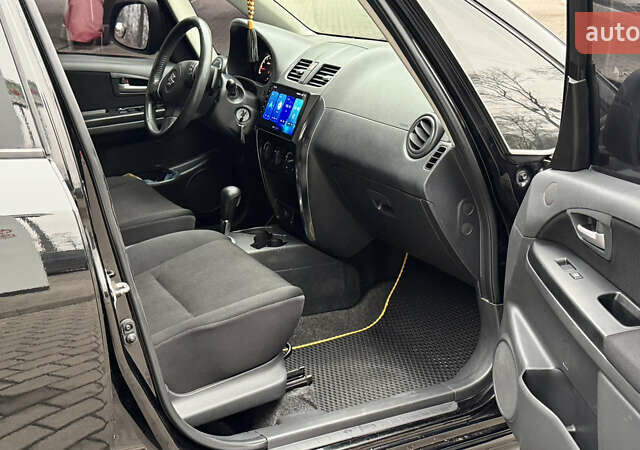 Чорний Сузукі СХ4, об'ємом двигуна 2 л та пробігом 240 тис. км за 6950 $, фото 18 на Automoto.ua