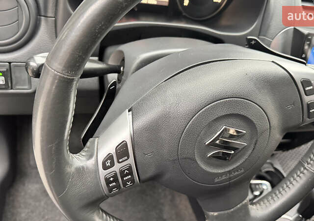Чорний Сузукі СХ4, об'ємом двигуна 2 л та пробігом 240 тис. км за 6950 $, фото 28 на Automoto.ua