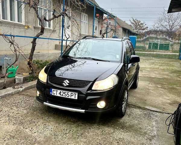 Черный Сузуки СХ4, объемом двигателя 1.6 л и пробегом 196 тыс. км за 3900 $, фото 1 на Automoto.ua