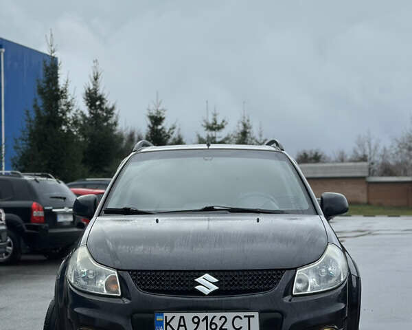 Черный Сузуки СХ4, объемом двигателя 1.59 л и пробегом 211 тыс. км за 7700 $, фото 2 на Automoto.ua