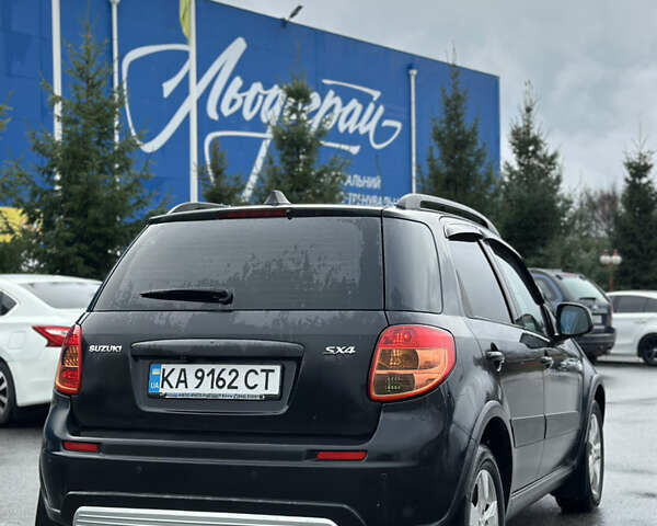 Черный Сузуки СХ4, объемом двигателя 1.59 л и пробегом 211 тыс. км за 7700 $, фото 8 на Automoto.ua
