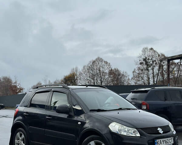 Черный Сузуки СХ4, объемом двигателя 1.59 л и пробегом 211 тыс. км за 7700 $, фото 4 на Automoto.ua