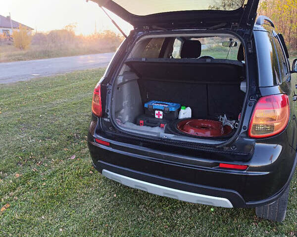 Черный Сузуки СХ4, объемом двигателя 1.6 л и пробегом 248 тыс. км за 8300 $, фото 15 на Automoto.ua