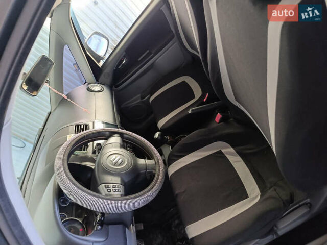 Черный Сузуки СХ4, объемом двигателя 1.6 л и пробегом 248 тыс. км за 8300 $, фото 24 на Automoto.ua