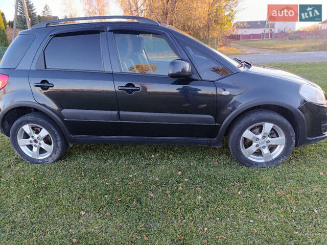 Черный Сузуки СХ4, объемом двигателя 1.6 л и пробегом 248 тыс. км за 8300 $, фото 17 на Automoto.ua