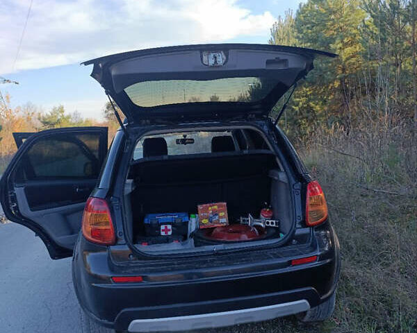 Черный Сузуки СХ4, объемом двигателя 1.6 л и пробегом 248 тыс. км за 8300 $, фото 21 на Automoto.ua