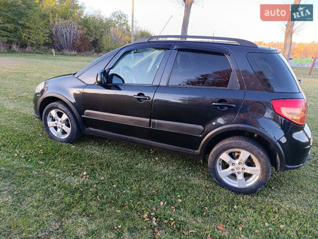 Черный Сузуки СХ4, объемом двигателя 1.6 л и пробегом 248 тыс. км за 8300 $, фото 13 на Automoto.ua