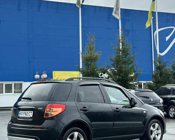 Черный Сузуки СХ4, объемом двигателя 1.59 л и пробегом 211 тыс. км за 7700 $, фото 7 на Automoto.ua