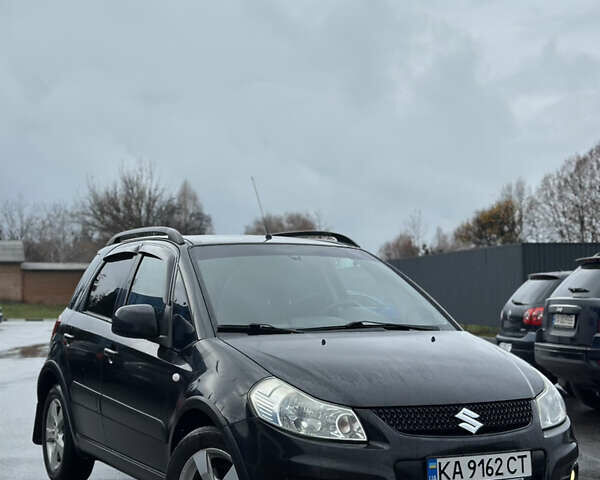 Черный Сузуки СХ4, объемом двигателя 1.59 л и пробегом 211 тыс. км за 7700 $, фото 3 на Automoto.ua