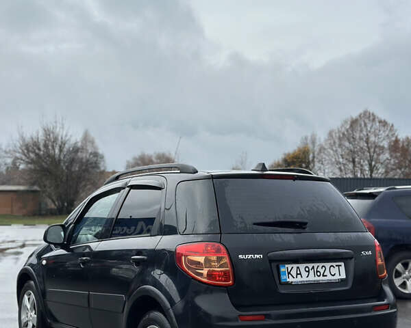 Черный Сузуки СХ4, объемом двигателя 1.59 л и пробегом 211 тыс. км за 7700 $, фото 10 на Automoto.ua