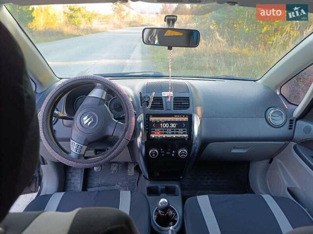 Черный Сузуки СХ4, объемом двигателя 1.6 л и пробегом 248 тыс. км за 8300 $, фото 3 на Automoto.ua