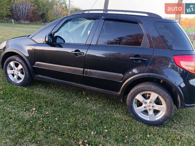 Черный Сузуки СХ4, объемом двигателя 1.6 л и пробегом 248 тыс. км за 8300 $, фото 7 на Automoto.ua