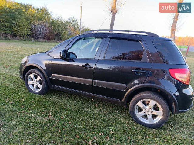 Черный Сузуки СХ4, объемом двигателя 1.6 л и пробегом 248 тыс. км за 8300 $, фото 12 на Automoto.ua