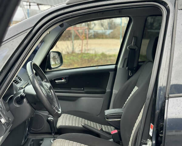 Черный Сузуки СХ4, объемом двигателя 1.59 л и пробегом 211 тыс. км за 7700 $, фото 13 на Automoto.ua