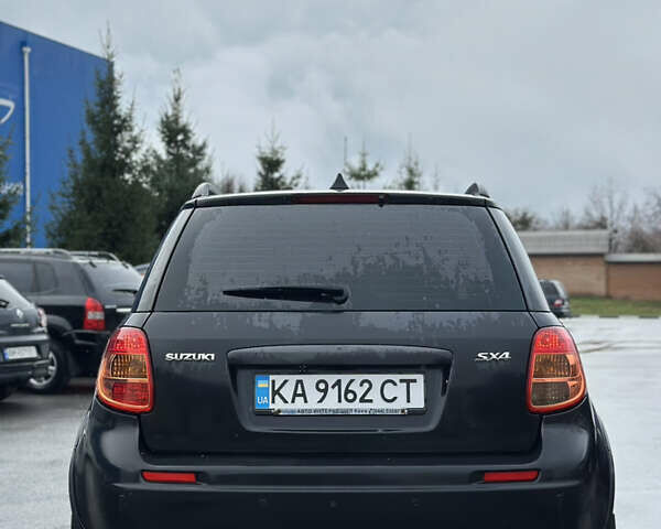 Черный Сузуки СХ4, объемом двигателя 1.59 л и пробегом 211 тыс. км за 7700 $, фото 9 на Automoto.ua