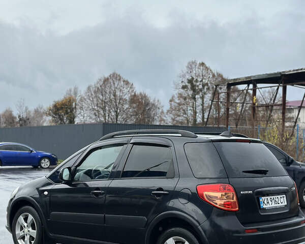 Черный Сузуки СХ4, объемом двигателя 1.59 л и пробегом 211 тыс. км за 7700 $, фото 11 на Automoto.ua