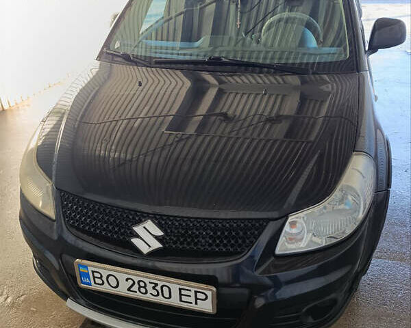 Черный Сузуки СХ4, объемом двигателя 1.6 л и пробегом 248 тыс. км за 8300 $, фото 4 на Automoto.ua