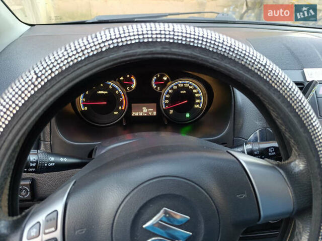 Черный Сузуки СХ4, объемом двигателя 1.6 л и пробегом 248 тыс. км за 8300 $, фото 8 на Automoto.ua