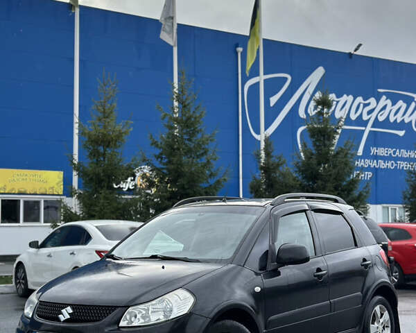 Черный Сузуки СХ4, объемом двигателя 1.59 л и пробегом 211 тыс. км за 7700 $, фото 1 на Automoto.ua