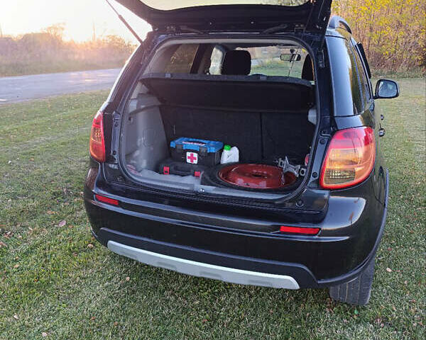 Черный Сузуки СХ4, объемом двигателя 1.6 л и пробегом 248 тыс. км за 8300 $, фото 14 на Automoto.ua