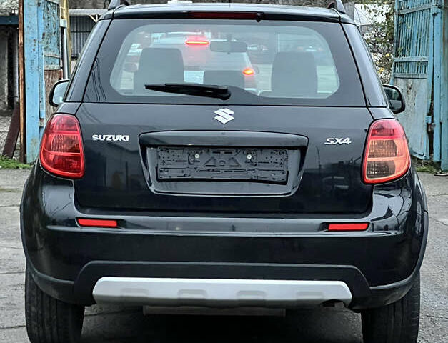 Черный Сузуки СХ4, объемом двигателя 1.59 л и пробегом 143 тыс. км за 8999 $, фото 3 на Automoto.ua