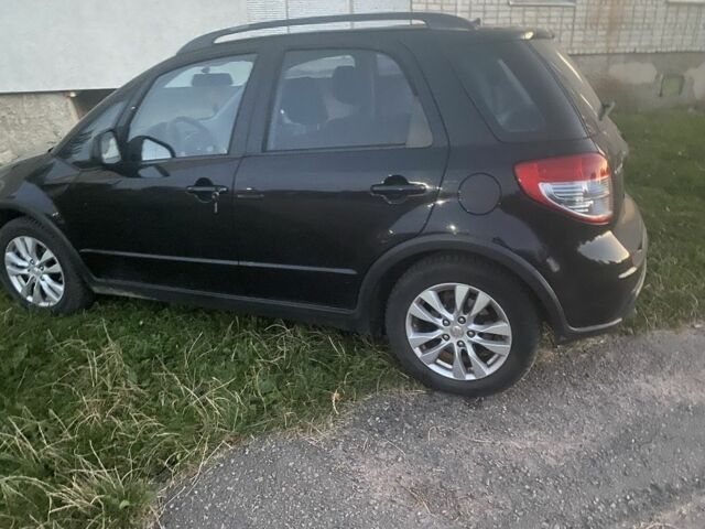 Черный Сузуки СХ4, объемом двигателя 2 л и пробегом 193 тыс. км за 8200 $, фото 2 на Automoto.ua