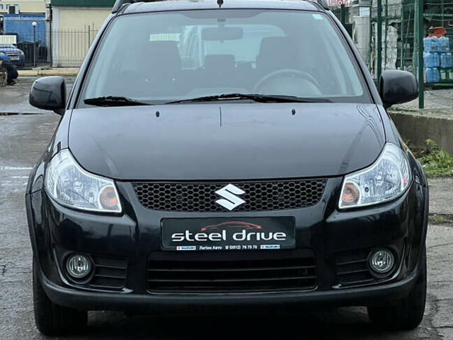Черный Сузуки СХ4, объемом двигателя 1.59 л и пробегом 143 тыс. км за 8999 $, фото 1 на Automoto.ua