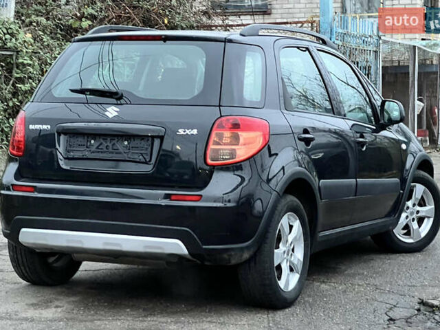 Черный Сузуки СХ4, объемом двигателя 1.59 л и пробегом 143 тыс. км за 8999 $, фото 2 на Automoto.ua