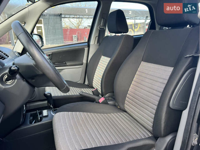 Черный Сузуки СХ4, объемом двигателя 1.59 л и пробегом 143 тыс. км за 8999 $, фото 5 на Automoto.ua