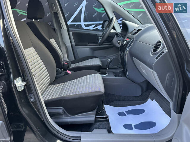 Черный Сузуки СХ4, объемом двигателя 1.6 л и пробегом 140 тыс. км за 8200 $, фото 7 на Automoto.ua