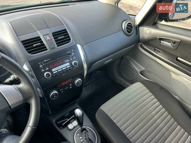 Черный Сузуки СХ4, объемом двигателя 1.59 л и пробегом 143 тыс. км за 8999 $, фото 6 на Automoto.ua