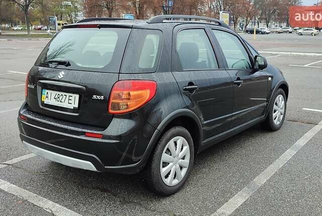 Черный Сузуки СХ4, объемом двигателя 1.6 л и пробегом 82 тыс. км за 11500 $, фото 6 на Automoto.ua