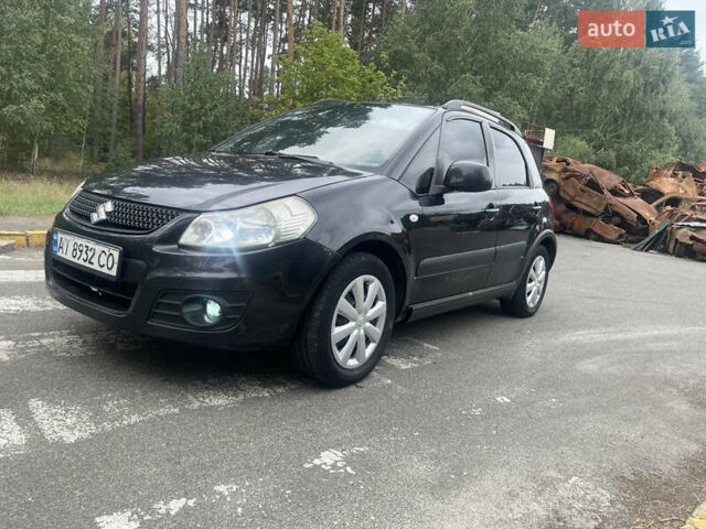 Черный Сузуки СХ4, объемом двигателя 1.59 л и пробегом 164 тыс. км за 9000 $, фото 1 на Automoto.ua