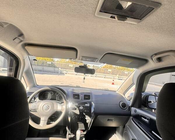 Черный Сузуки СХ4, объемом двигателя 1.6 л и пробегом 81 тыс. км за 11900 $, фото 5 на Automoto.ua