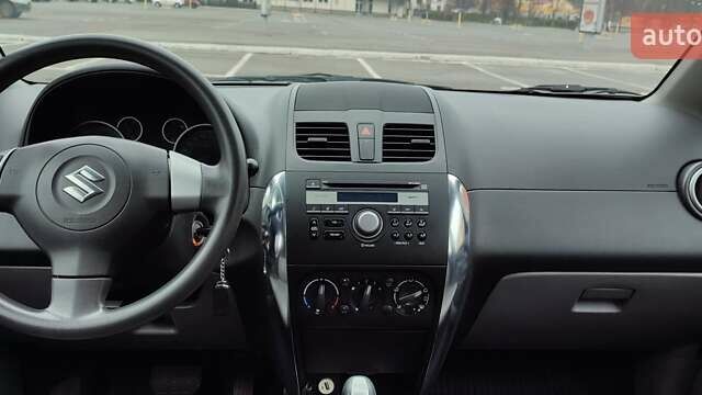 Черный Сузуки СХ4, объемом двигателя 1.6 л и пробегом 82 тыс. км за 11500 $, фото 11 на Automoto.ua