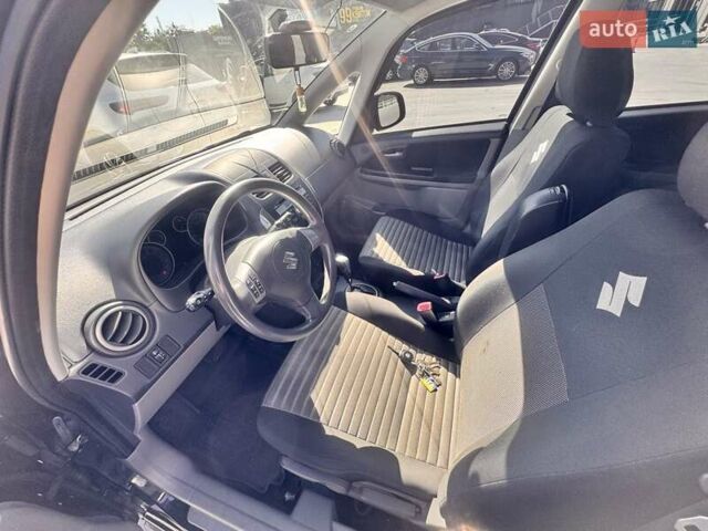 Черный Сузуки СХ4, объемом двигателя 1.6 л и пробегом 81 тыс. км за 11900 $, фото 12 на Automoto.ua