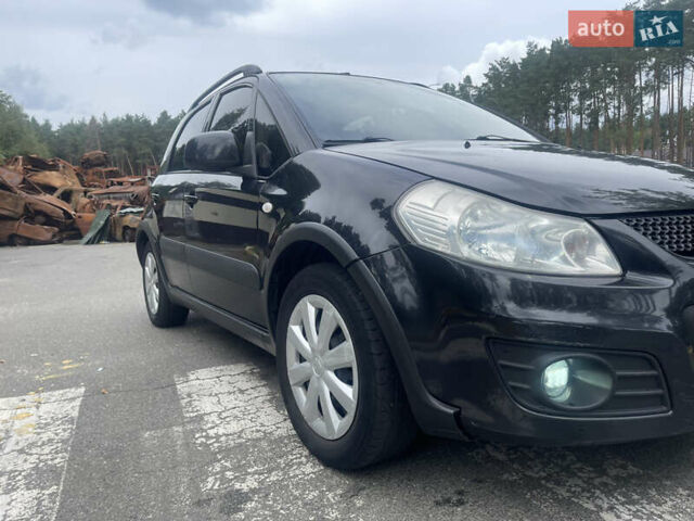 Черный Сузуки СХ4, объемом двигателя 1.59 л и пробегом 164 тыс. км за 9000 $, фото 2 на Automoto.ua