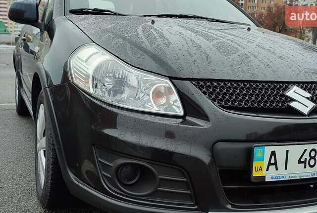 Черный Сузуки СХ4, объемом двигателя 1.6 л и пробегом 82 тыс. км за 11500 $, фото 3 на Automoto.ua