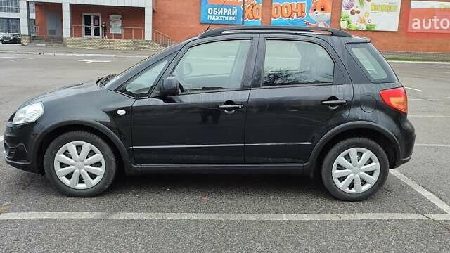 Черный Сузуки СХ4, объемом двигателя 1.6 л и пробегом 82 тыс. км за 11500 $, фото 7 на Automoto.ua