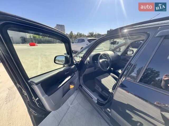 Черный Сузуки СХ4, объемом двигателя 1.6 л и пробегом 81 тыс. км за 11900 $, фото 13 на Automoto.ua