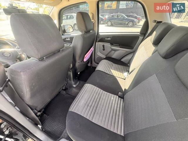 Черный Сузуки СХ4, объемом двигателя 1.6 л и пробегом 81 тыс. км за 11900 $, фото 15 на Automoto.ua