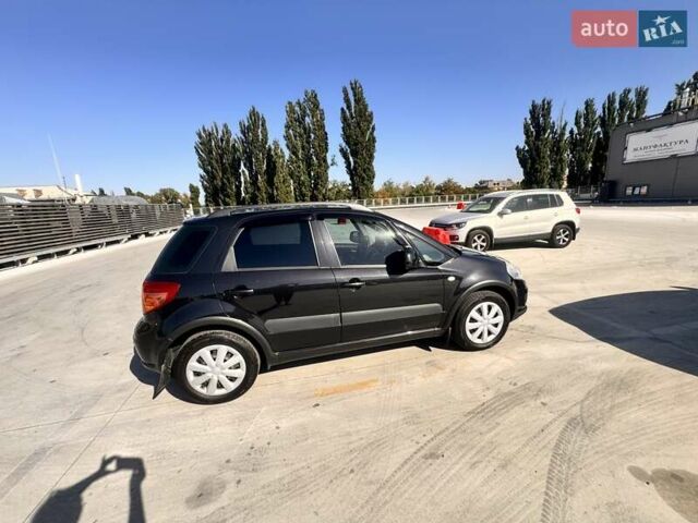 Черный Сузуки СХ4, объемом двигателя 1.6 л и пробегом 81 тыс. км за 11900 $, фото 2 на Automoto.ua