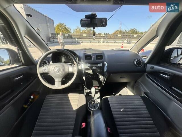 Черный Сузуки СХ4, объемом двигателя 1.6 л и пробегом 81 тыс. км за 11900 $, фото 6 на Automoto.ua