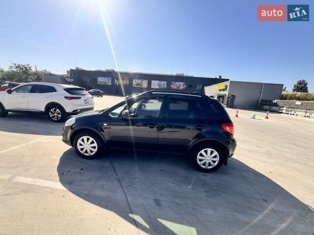 Черный Сузуки СХ4, объемом двигателя 1.6 л и пробегом 81 тыс. км за 11900 $, фото 4 на Automoto.ua