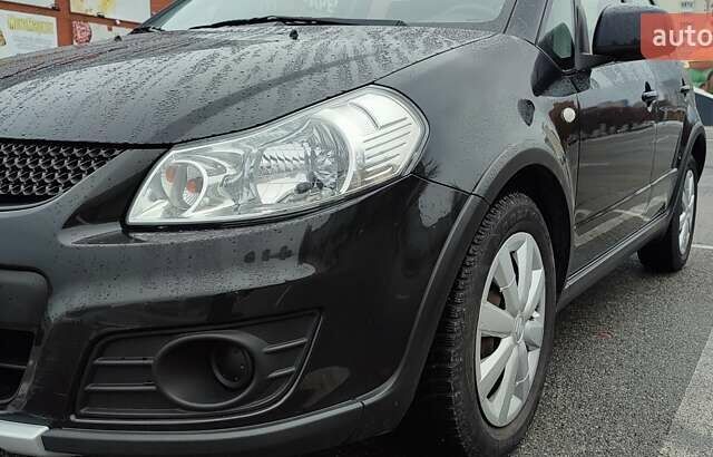 Черный Сузуки СХ4, объемом двигателя 1.6 л и пробегом 82 тыс. км за 11500 $, фото 4 на Automoto.ua