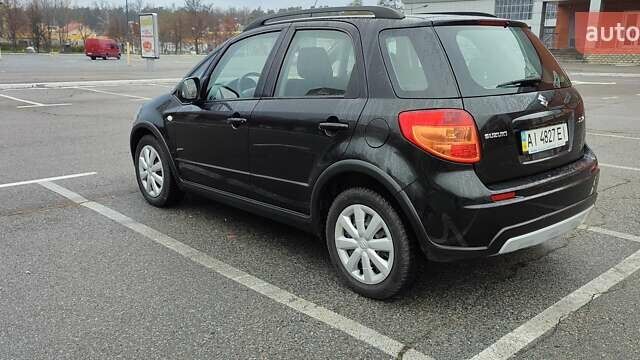 Черный Сузуки СХ4, объемом двигателя 1.6 л и пробегом 82 тыс. км за 11500 $, фото 5 на Automoto.ua